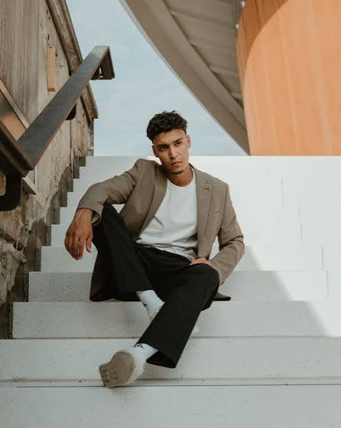 Urban Streetwear — Minimalist Smart-Casual Staircase Portrait