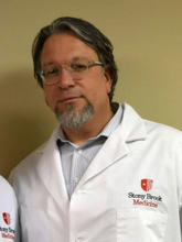 Augustine Romano, MD