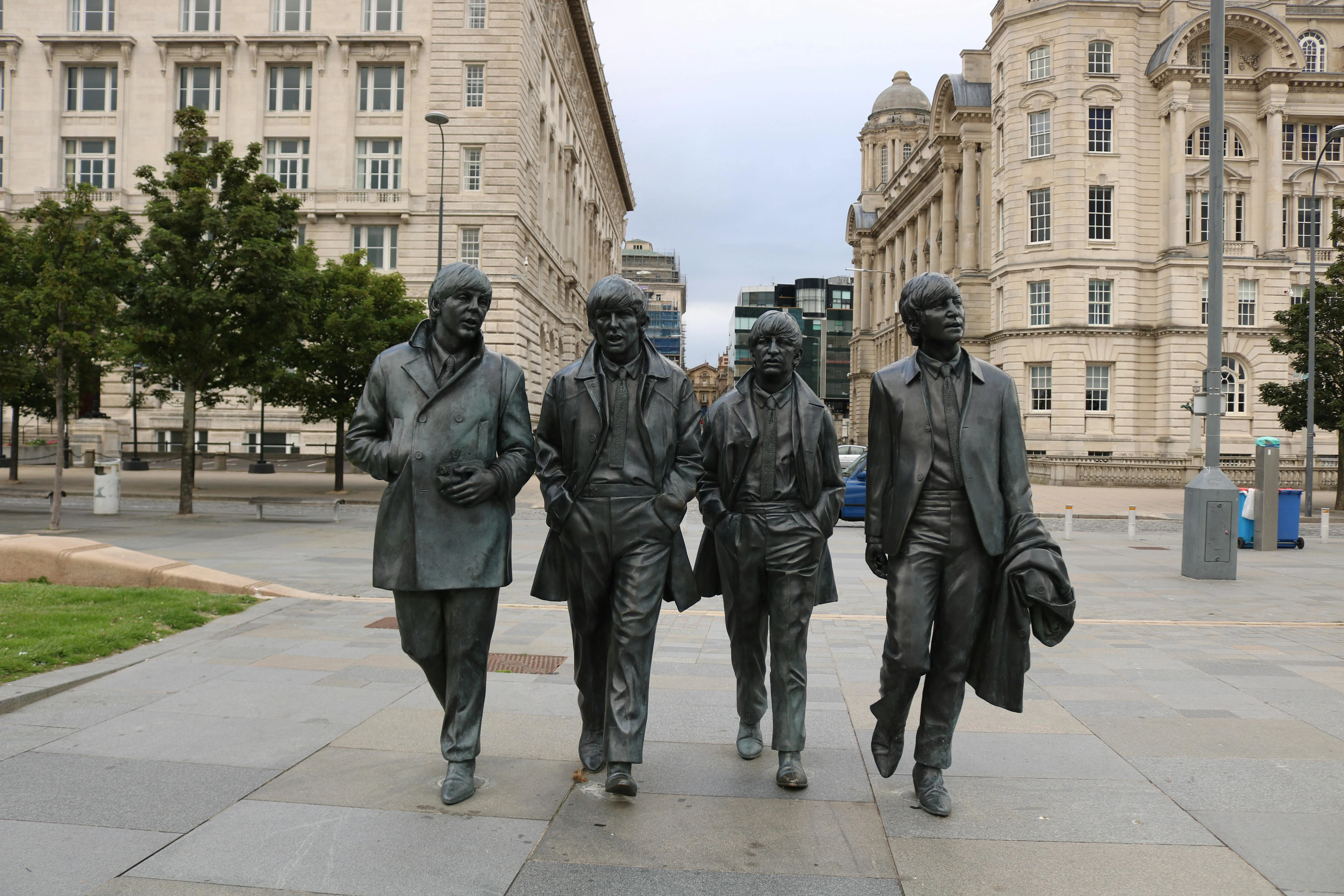 Liverpool Beatles sites including Penny Lane street sign and Abbey Road Studios at golden hour in Merseyside England