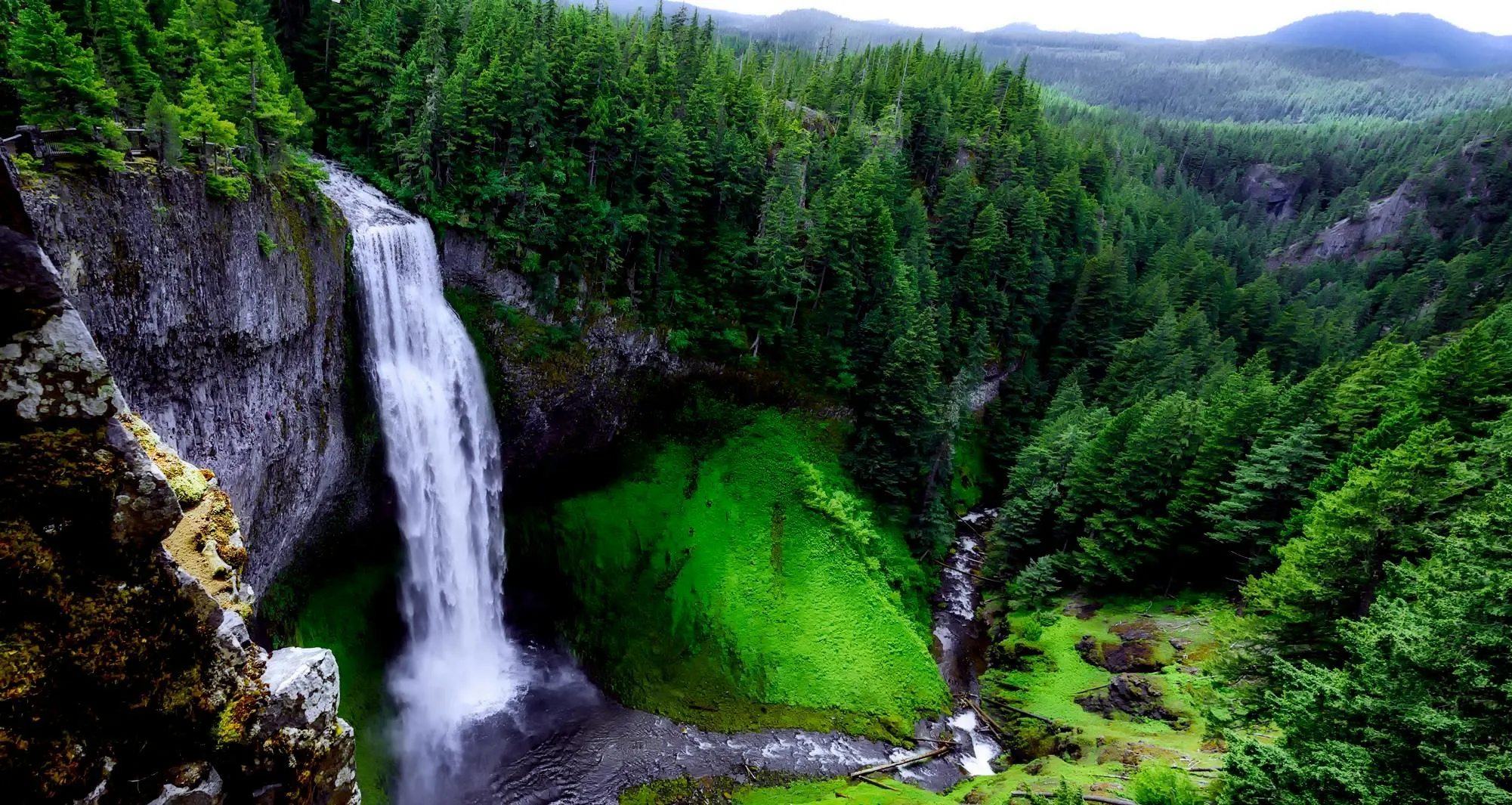 Triberg Waterfalls cascading down granite rocks with lush Black Forest greenery and mist in Germany