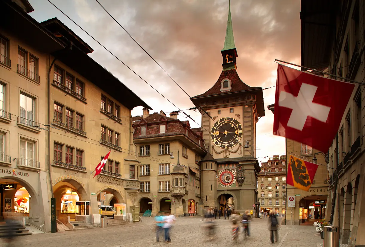 Zytglogge clock tower at sunrise with medieval mechanism, Bern old town, and golden light in Switzerland