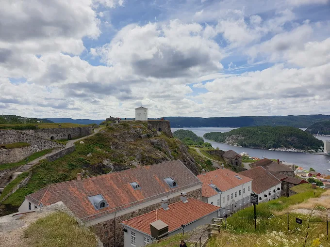Fredriksten fortress Halden Norway at sunset with stone walls and panoramic view over town and harbor